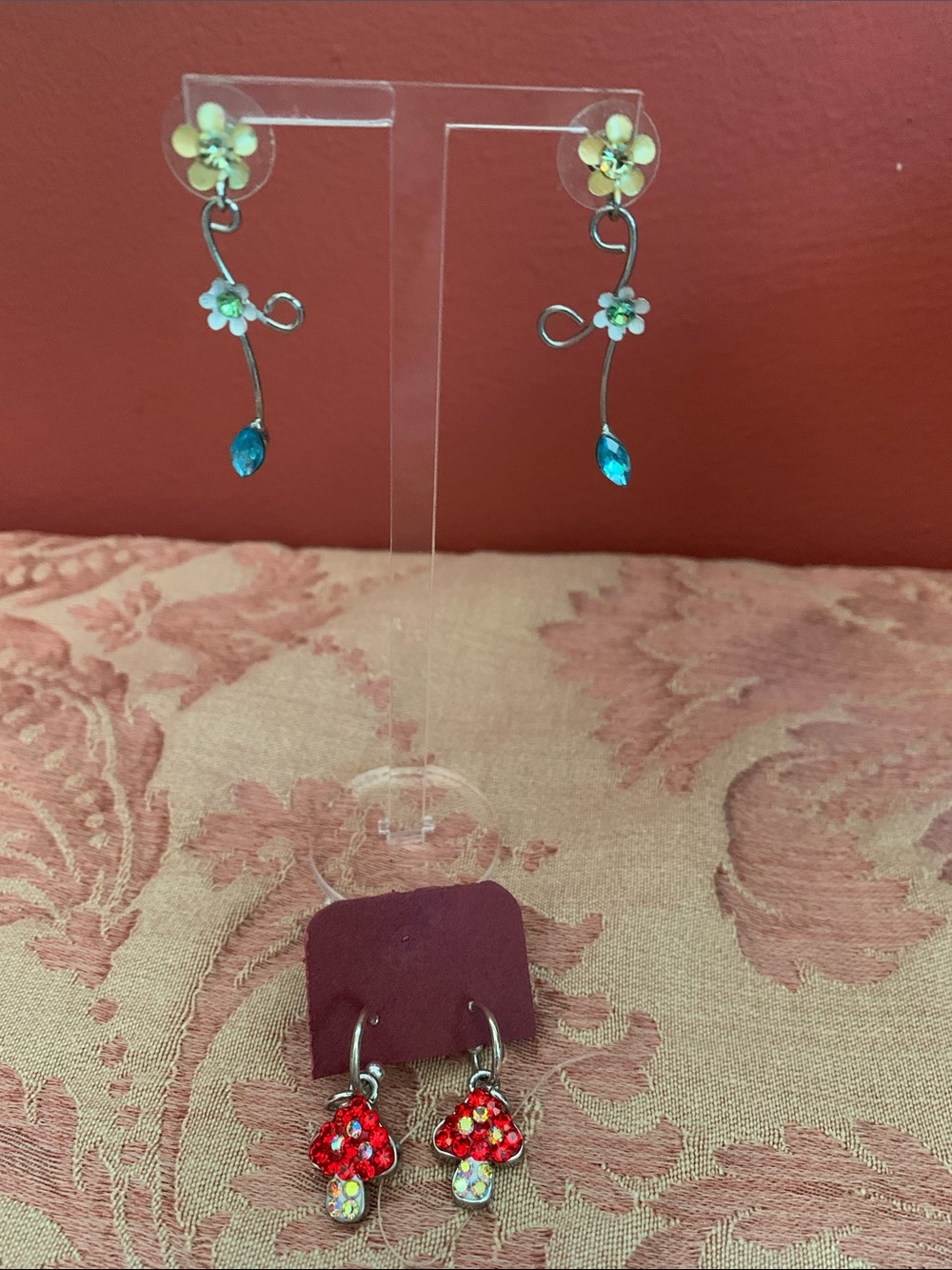 Earrings that include mushrooms hearts and flowers CHARMING